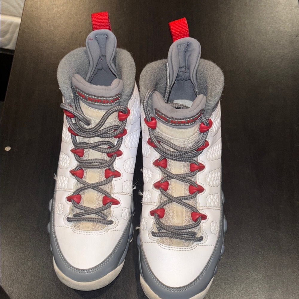 Stylish White and Gray Sneakers with Red Accents